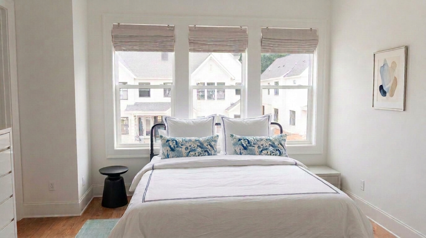 Luxury bedroom with California King bed and designer linens